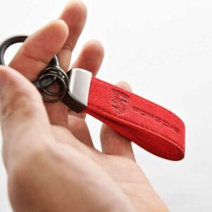 Porsche Macan Shield Carbon Fiber Keychain with Red Synthetic Fiber Strap – Key Strap Keychain from the Vintage store collection.