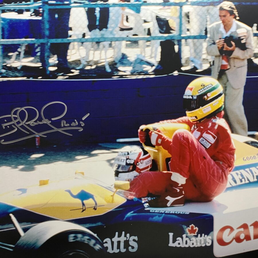 Nigel Mansell signed 'taxi for Senna' photograph (pits), 1991 British Fromula 1 Grand Prix from the Ayrton Senna store collection.