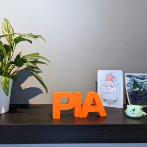 Oscar PIAstri - Formula 1 - PIA Text Sign - McLaren - Decorative, great gift for avid F1 and Oscar Piastri fans from the Race Car Wall Art store collection.